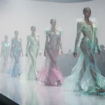 Future of Fabric: 3 Innovative Textile Trends Revolutionizing Fashion Models showcasing innovative futuristic fabrics on a runway