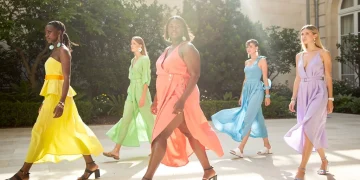 Models displaying sustainable and vibrant Spring 2026 fashion trends outdoors.